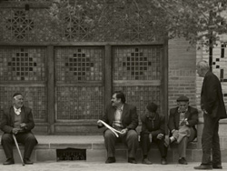 Men chatting in Qazvin, Iran.
